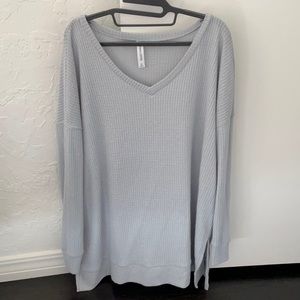 Grayish/light blue v-neck sweater
